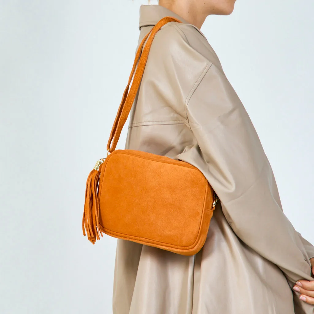 Suede crossbody bag with tassel wholesale