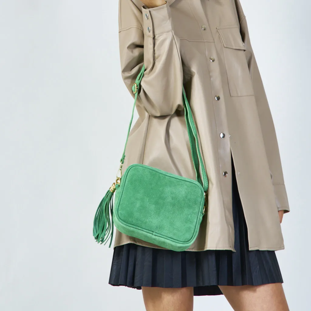 Suede crossbody bag with tassel wholesale