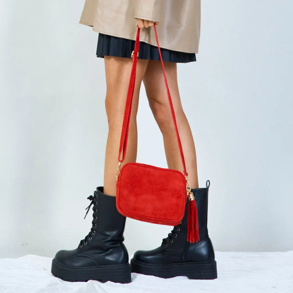 Suede crossbody bag with tassel wholesale
