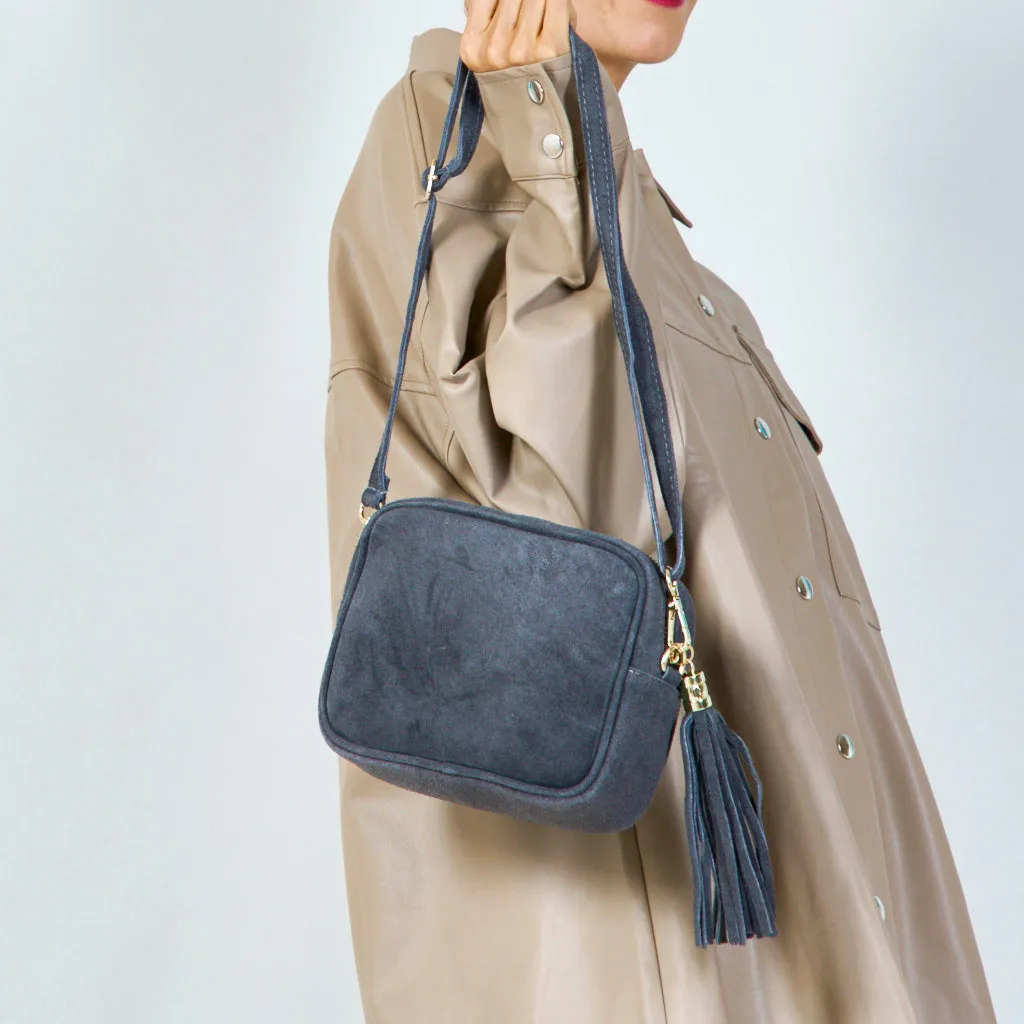 Suede crossbody bag with tassel wholesale