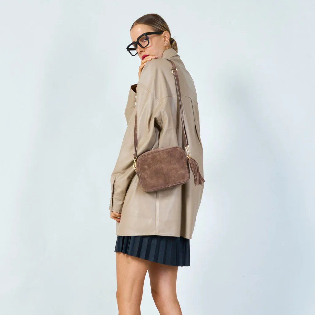 Suede crossbody bag with tassel wholesale